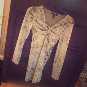 Long sleeve green blouse.